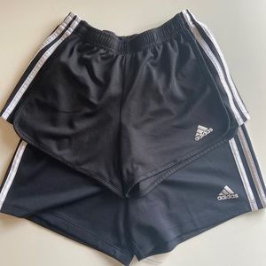 Two pairs of black Adidas shorts